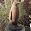 Monty the Penguin Stone Garden Ornament (Rust)
